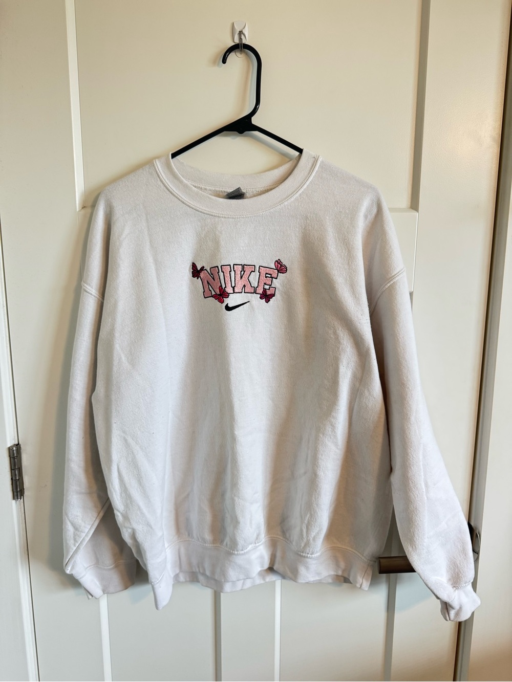 Nike White Crew Sweatshirt with Pink Logo Flowers